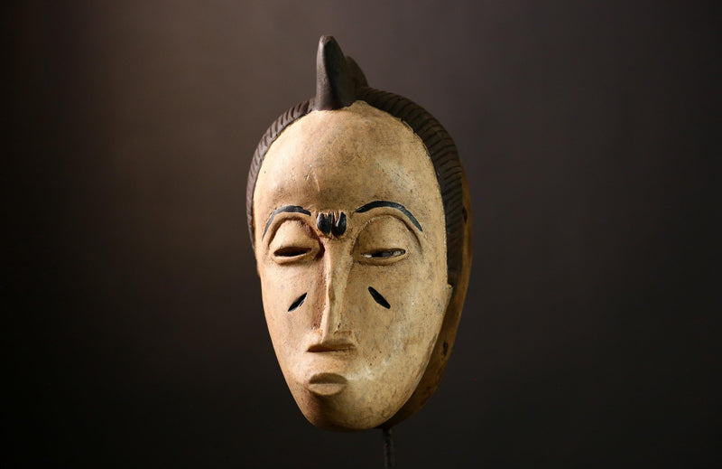 African Guro Mask: Hand-Carved Wooden Tribal Art | Unique Black Wall Decor | Authentic Sculpture for Home and Gallery Display-G4015