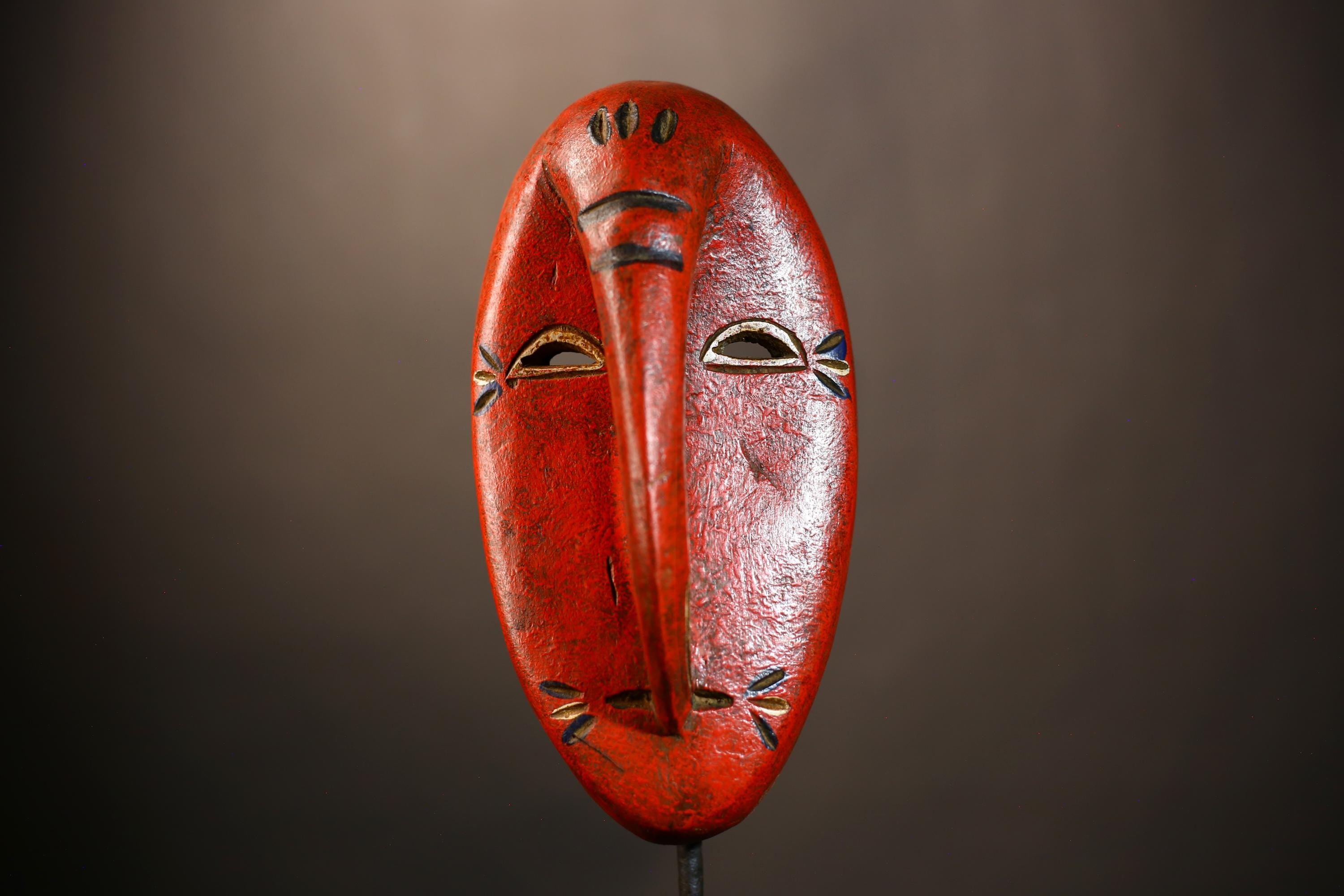 African Tribal Red Elephant Nose Mask | Unique Wooden Face Art Decor | Handcrafted Ethnic Wall Hanging | Vibrant Cultural Home Accent-G4953