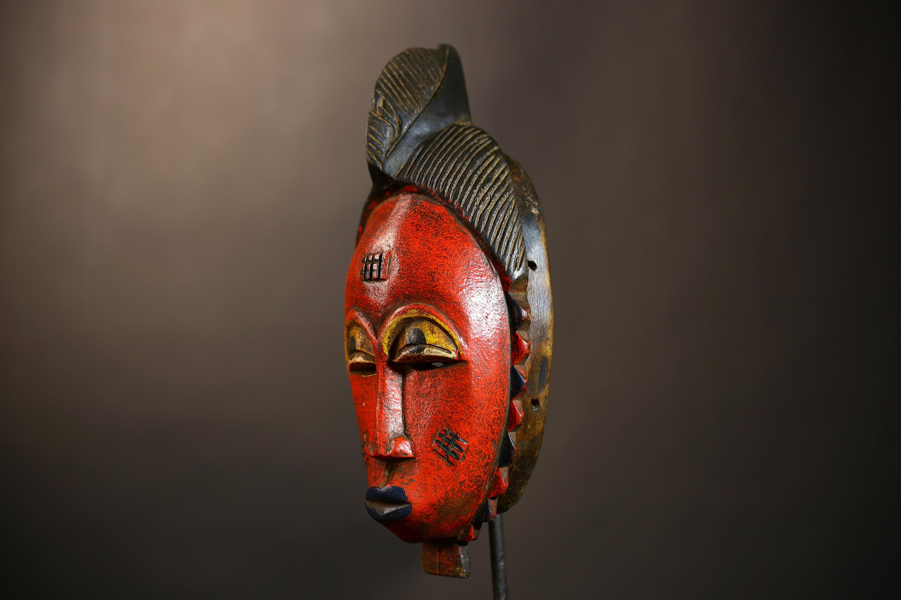 Hand-Carved Africa Guro Baule Mask | Red Color Wall Hanging | Unique Collectible Art | Ethnic Decor for Home | Cultural Heritage Piece-G4957