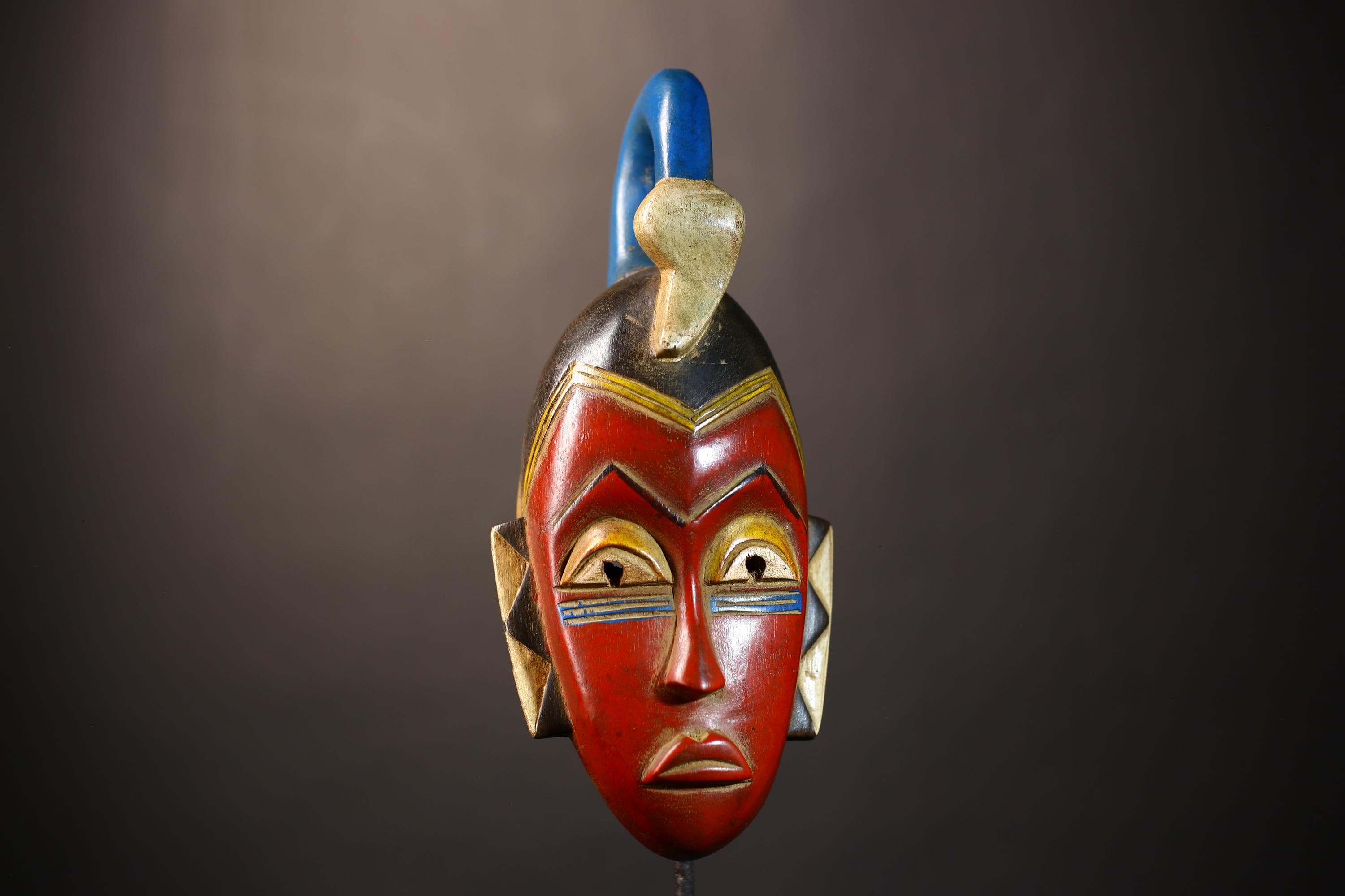 African Unique Baule Guro Mask | Orange Wooden Wall Art Decor for Display | Cultural Accent for Home | Artisan Craftsmanship-G5015
