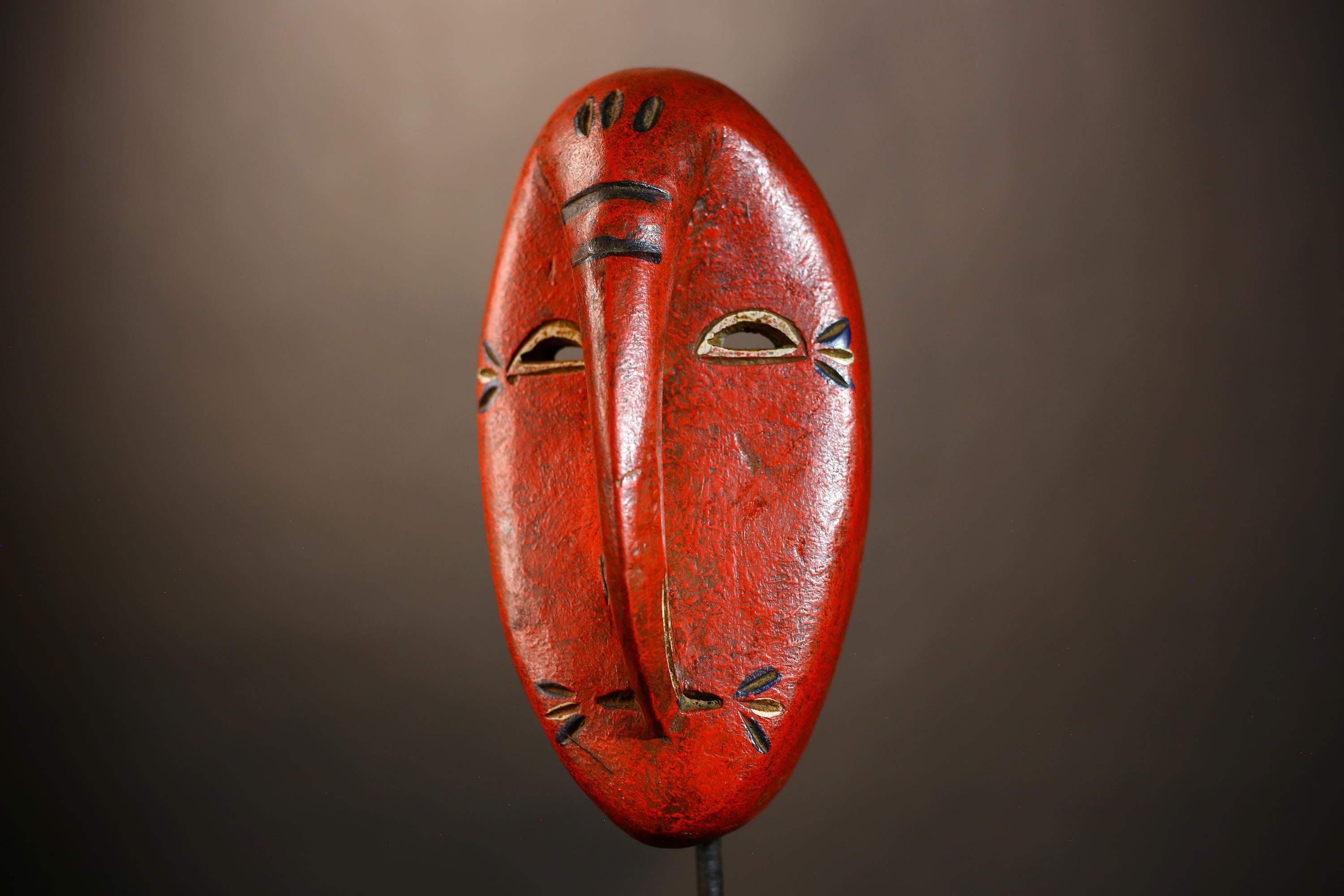 African Tribal Red Elephant Nose Mask | Unique Wooden Face Art Decor | Handcrafted Ethnic Wall Hanging | Vibrant Cultural Home Accent-G4953