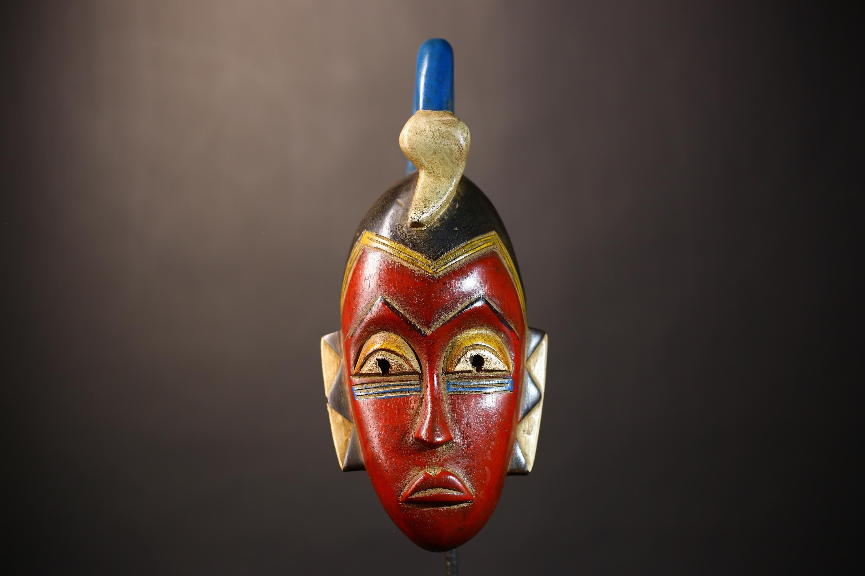 African Unique Baule Guro Mask | Orange Wooden Wall Art Decor for Display | Cultural Accent for Home | Artisan Craftsmanship-G5015