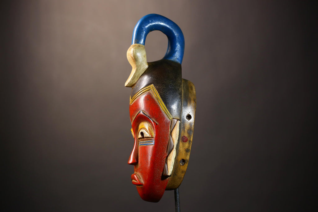 African Unique Baule Guro Mask | Orange Wooden Wall Art Decor for Display | Cultural Accent for Home | Artisan Craftsmanship-G5015