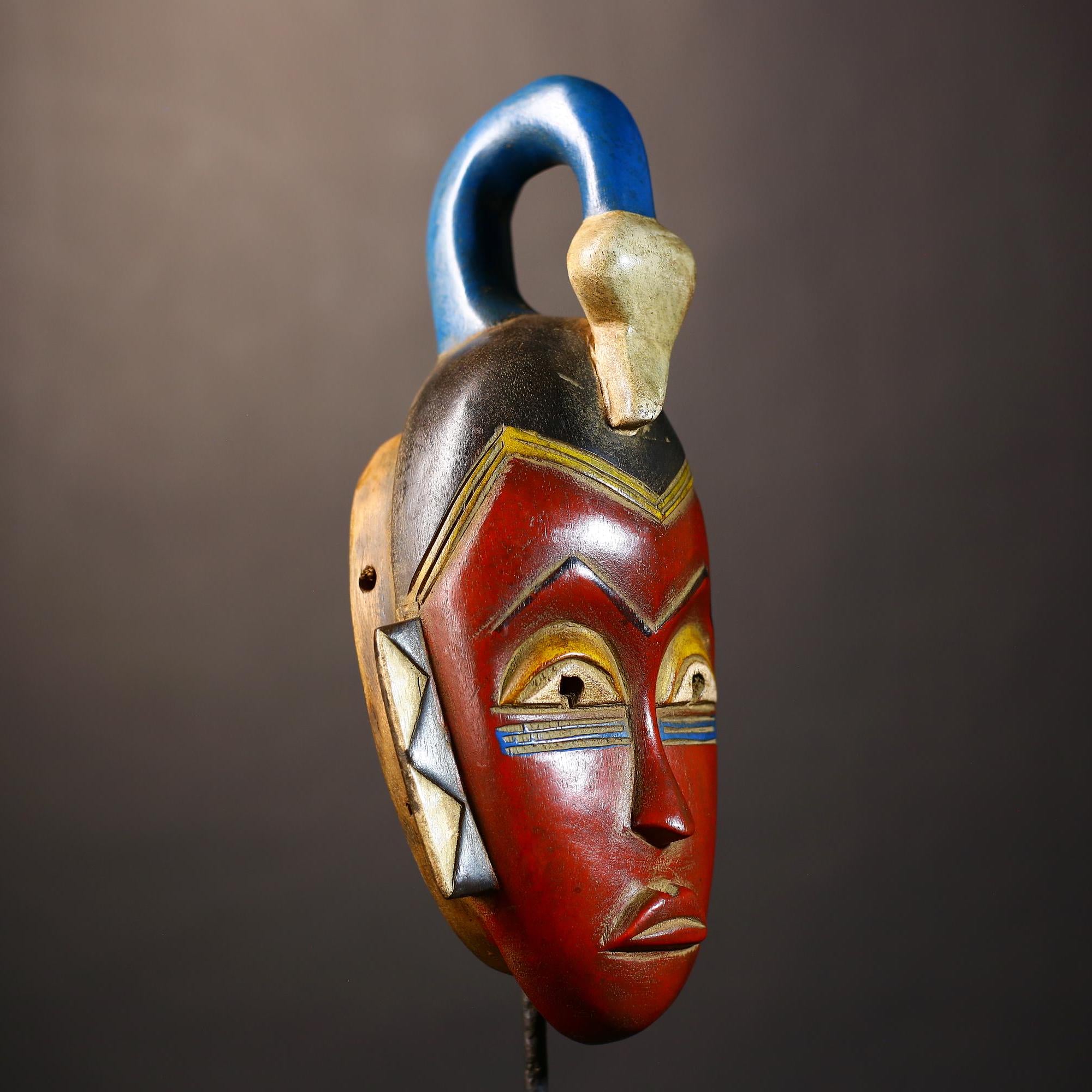 African Unique Baule Guro Mask | Orange Wooden Wall Art Decor for Display | Cultural Accent for Home | Artisan Craftsmanship-G5015