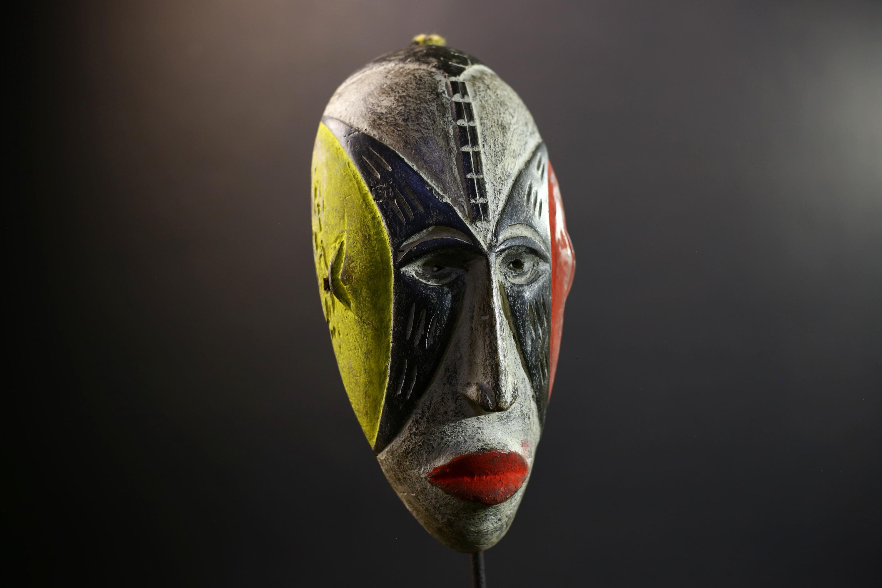 Hand Carved Bega Mask | African Tribal Face Mask in Red Yellow Black | Painted Wall Art Sculpture | West African Cultural Decor-G5293