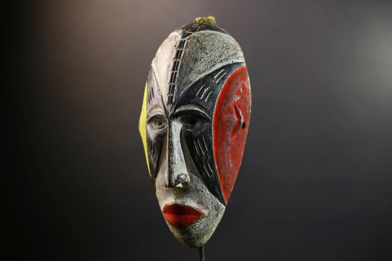 Hand Carved Bega Mask | African Tribal Face Mask in Red Yellow Black | Painted Wall Art Sculpture | West African Cultural Decor-G5293