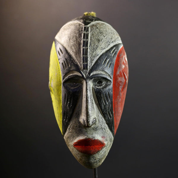 Hand Carved Bega Mask | African Tribal Face Mask in Red Yellow Black | Painted Wall Art Sculpture | West African Cultural Decor-G5293