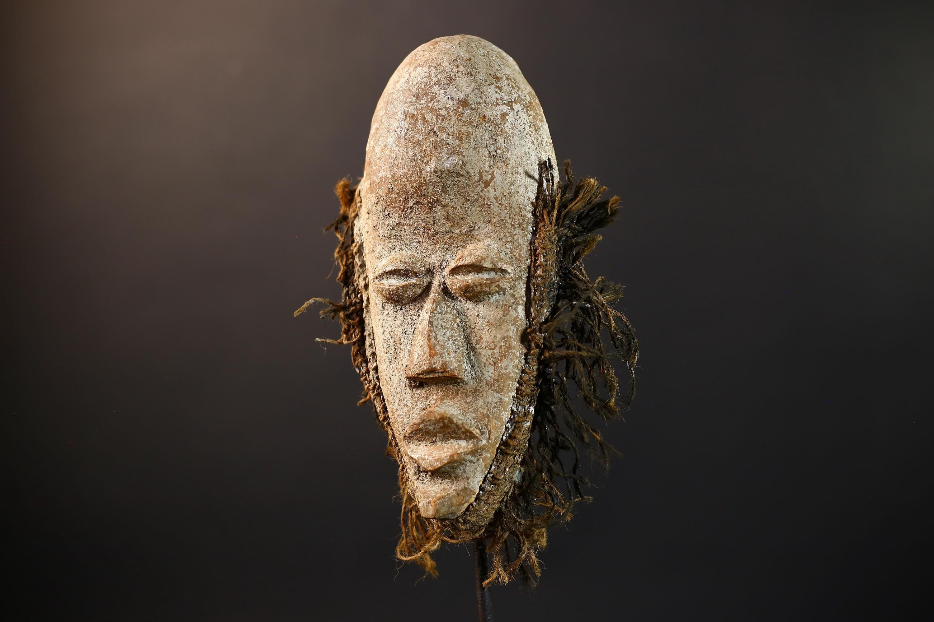 African Dan Mask | White Kaolin Wood Mask | Hand-Carved Tribal Wall Art | Spirit Face Sculpture | Traditional Raffia African Decor-G5249