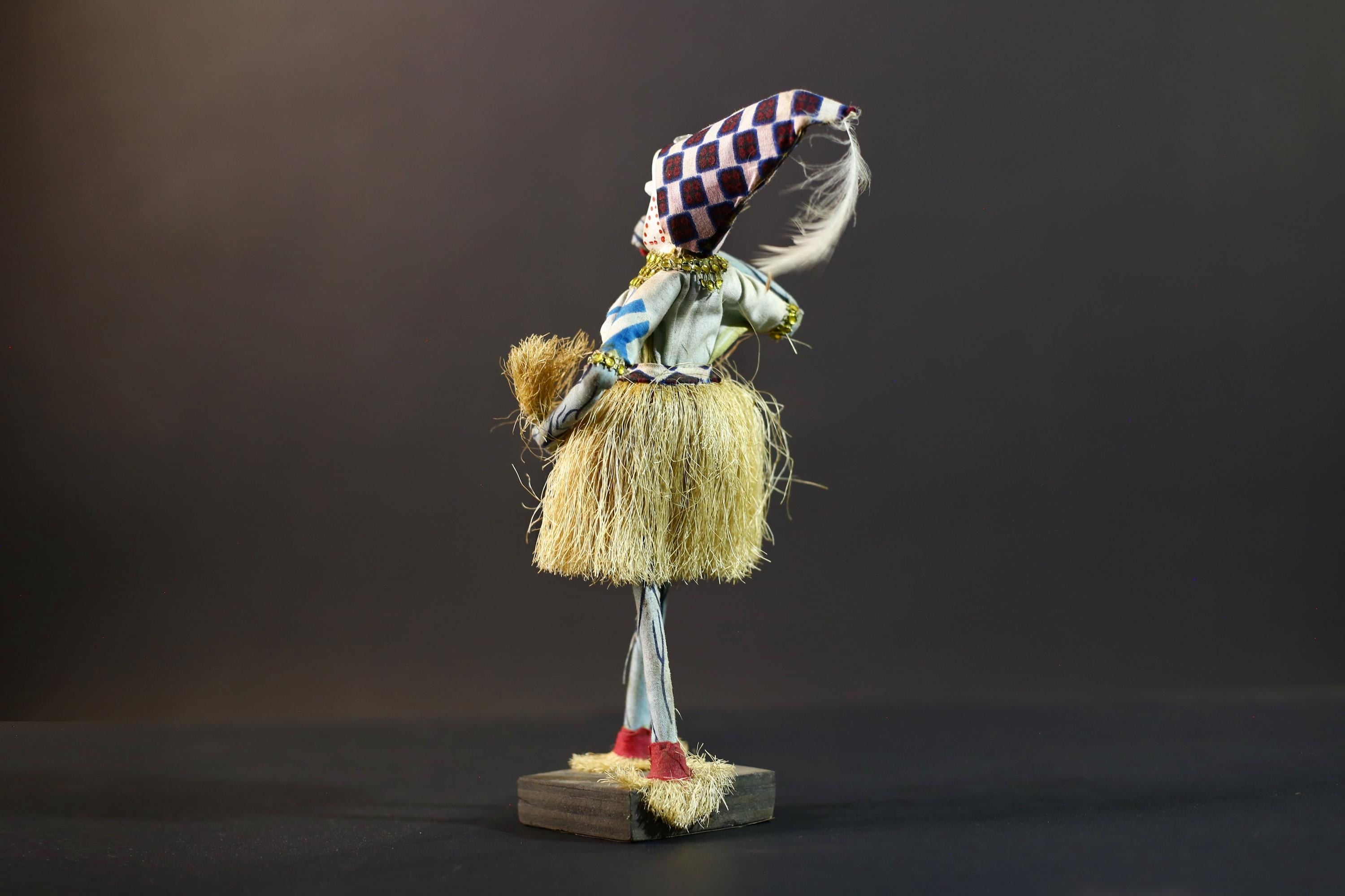African Raffia Masquerade Doll | Handcrafted Tribal Figurine | Multicolor Folk Art | Wood Base Decor-G5276