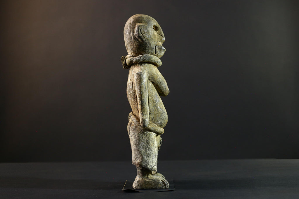 African Songye statue wood ancestor figure tribal spirit art Congo ritual carving handmade sculpture hollow eyes symbolic charm decor-G5373