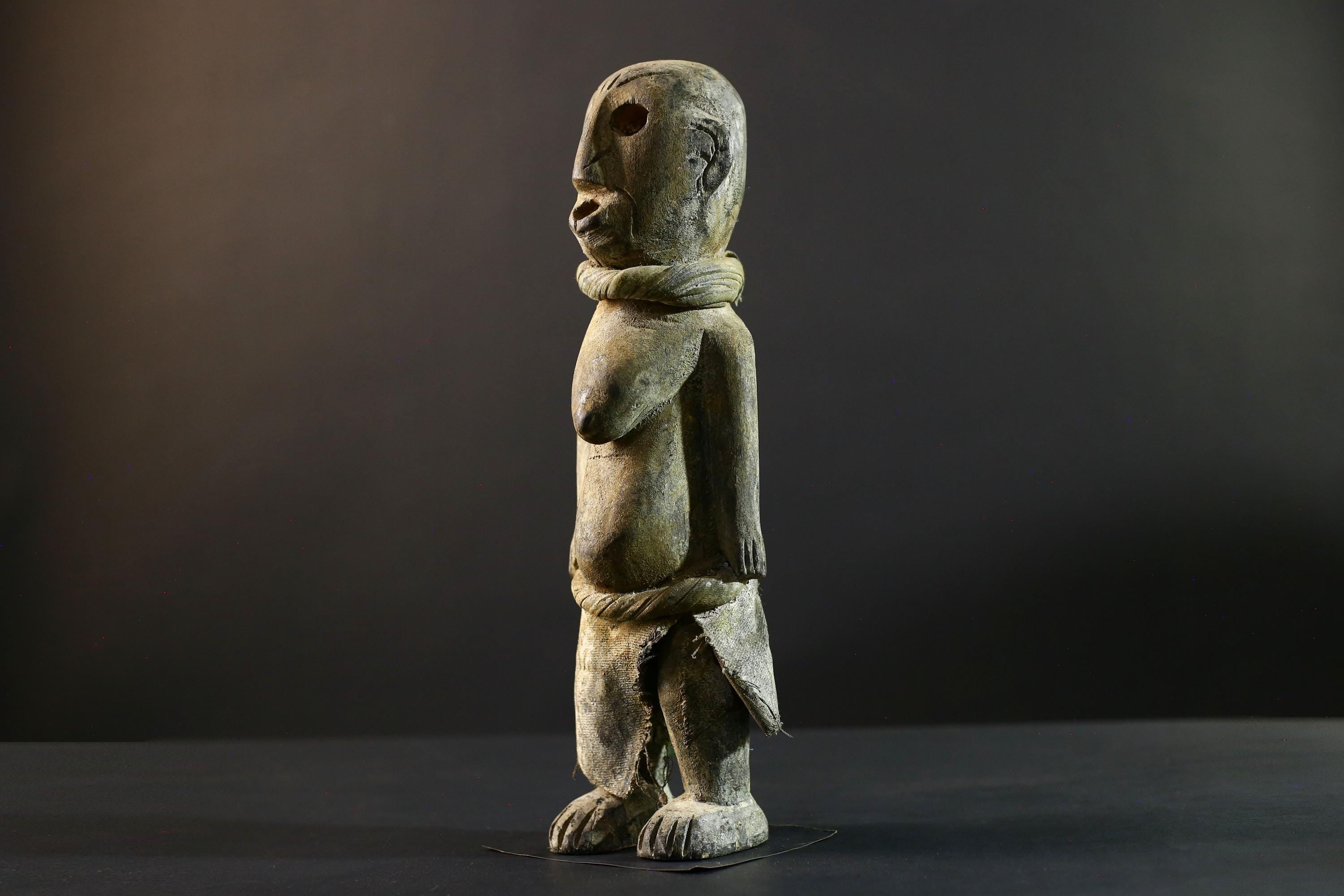 African Songye statue wood ancestor figure tribal spirit art Congo ritual carving handmade sculpture hollow eyes symbolic charm decor-G5373