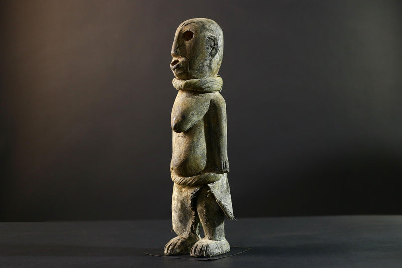 African Songye statue wood ancestor figure tribal spirit art Congo ritual carving handmade sculpture hollow eyes symbolic charm decor-G5373