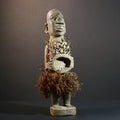 African Nkisi Nkondi nailed fetish statue Congo power figure tribal charm carved wood ritual art protective totem cavity raffia skirt-G5371