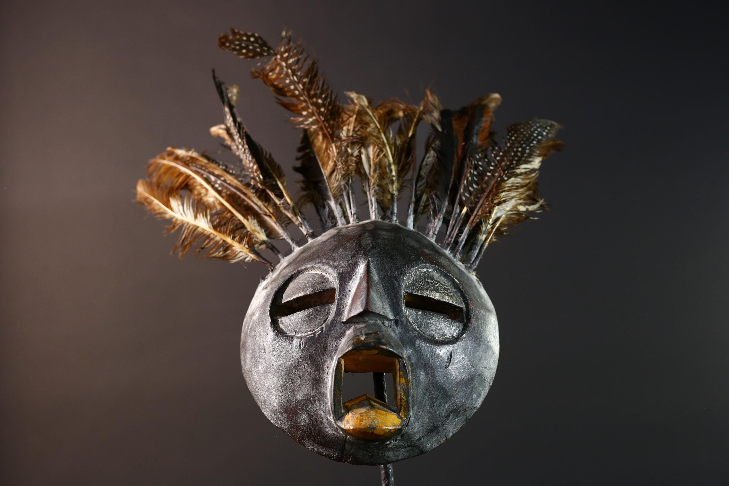Bobo tribal feathered mask African wall decor from Burkina Faso round face ceremonial wood carving rustic spiritual sculpture-G5434