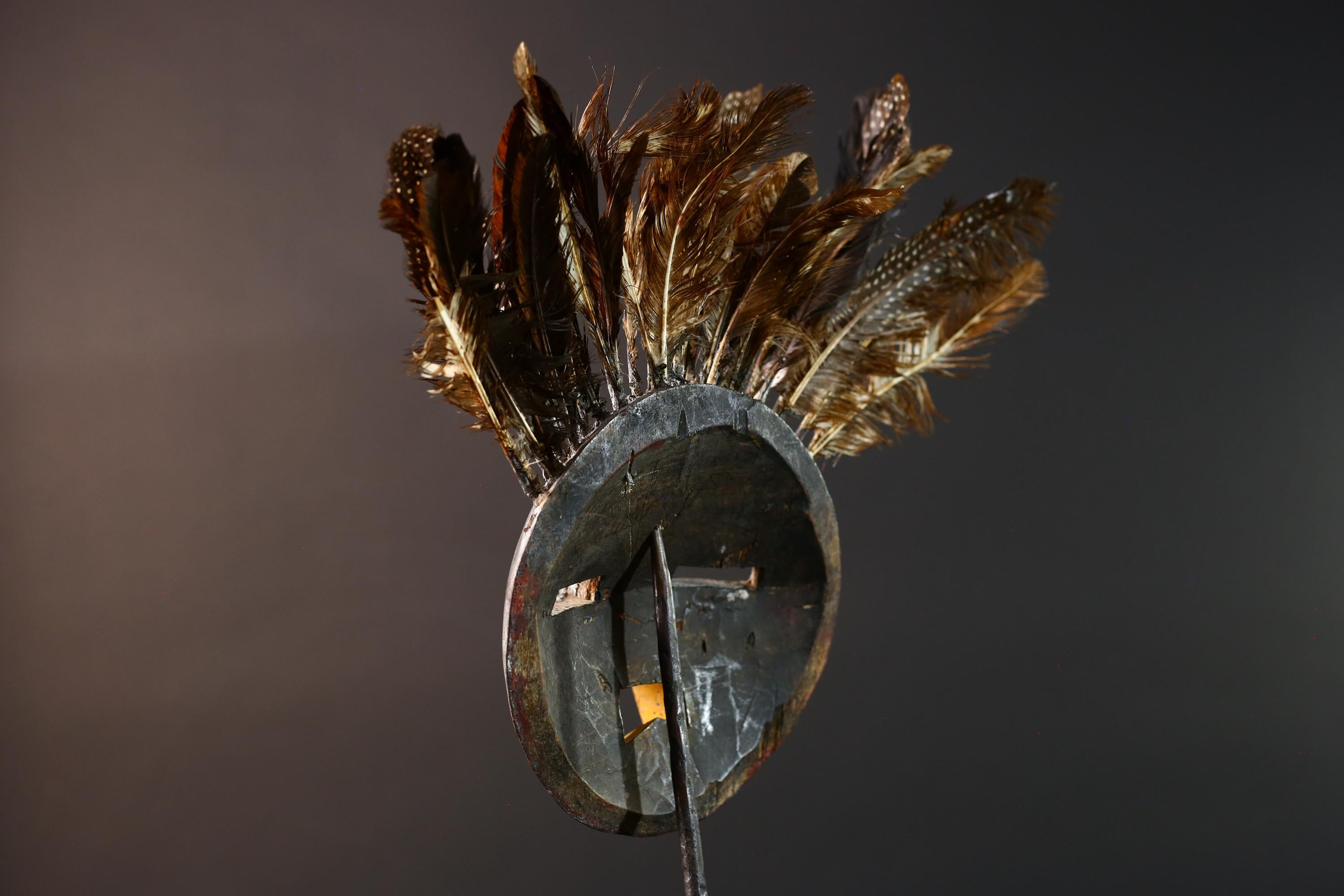 Bobo tribal feathered mask African wall decor from Burkina Faso round face ceremonial wood carving rustic spiritual sculpture-G5434