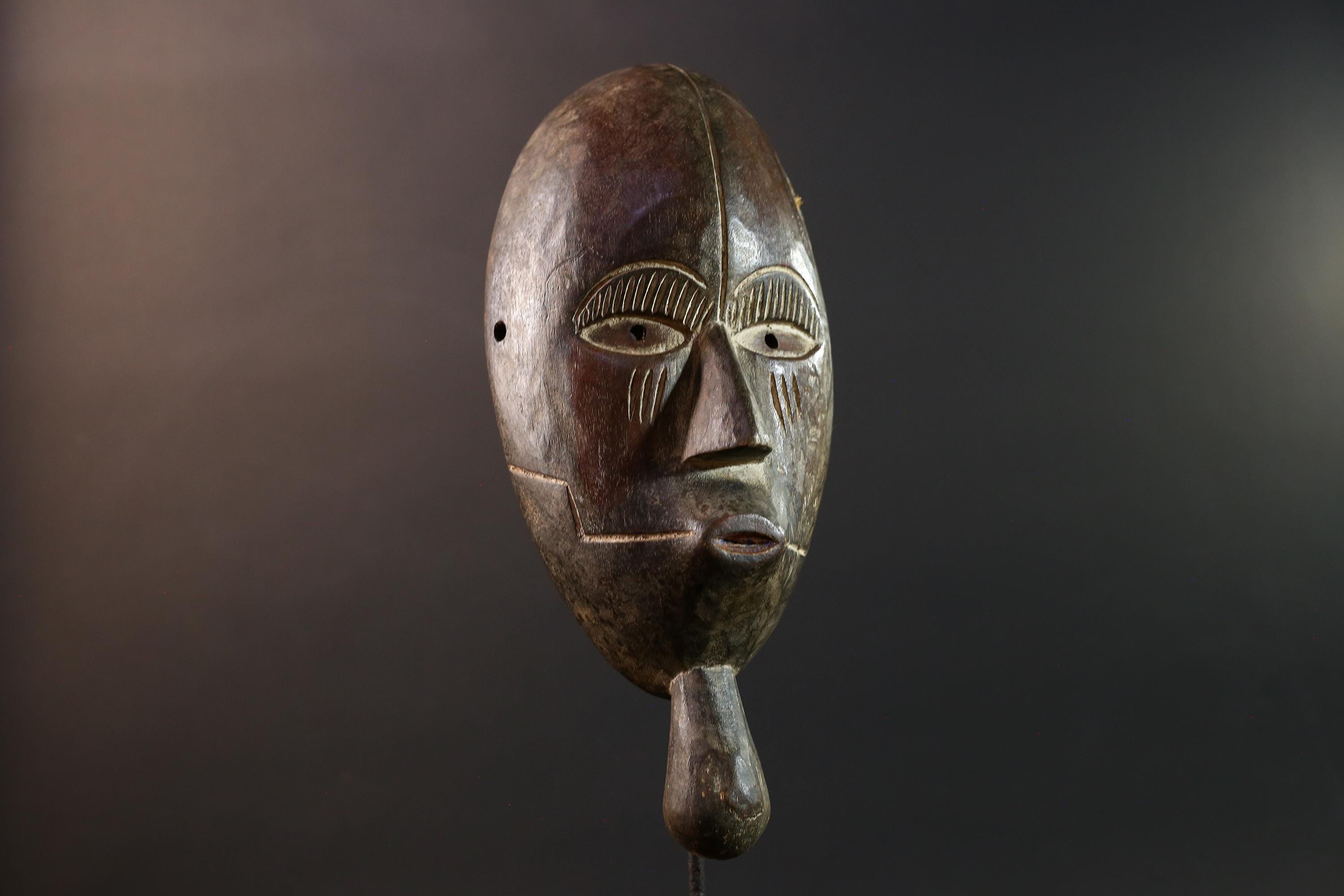Dan tribal mask African carved wood wall decor with chin extension from Côte d’Ivoire Liberia ceremonial rustic art face carving-G5436