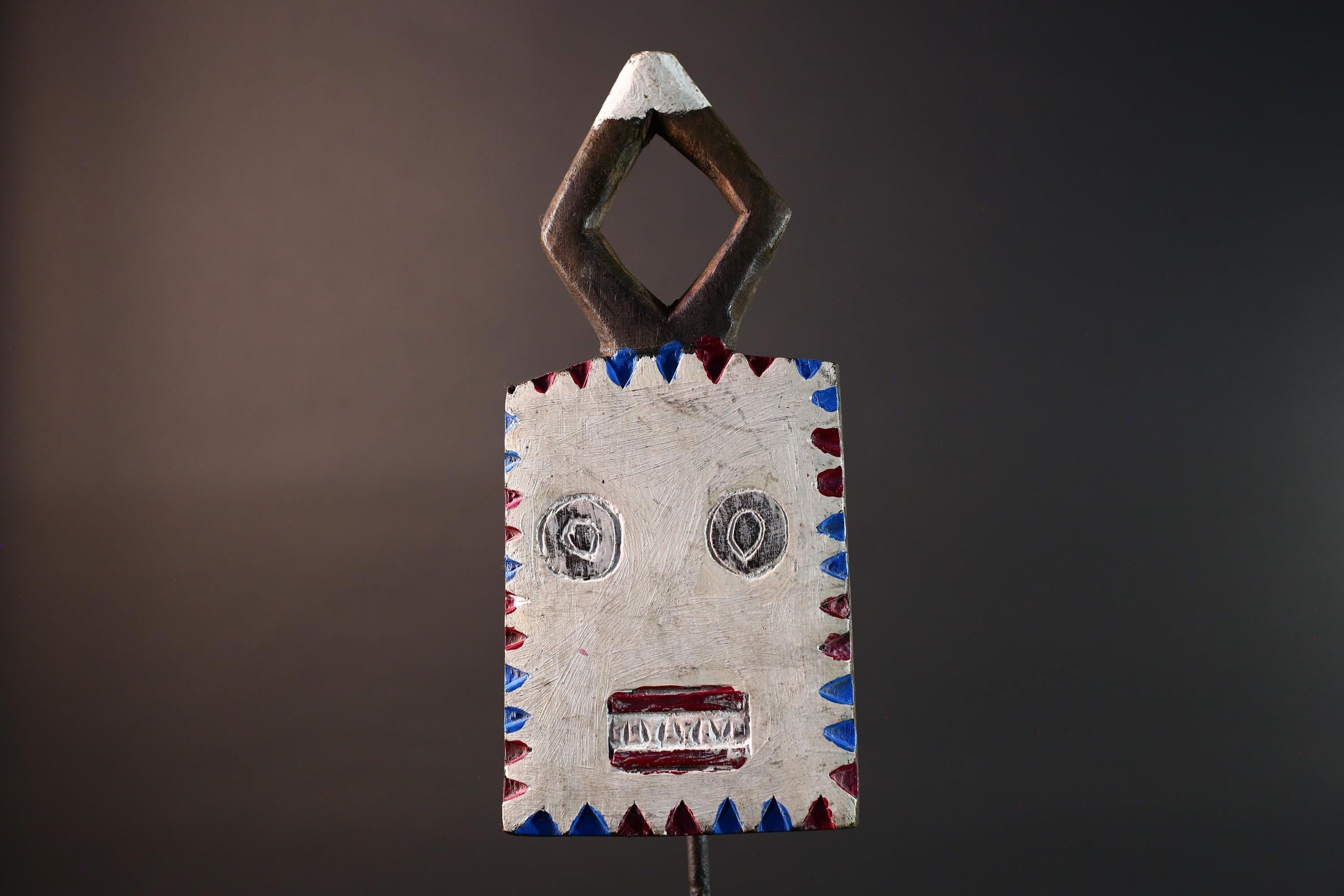 African wall mask Bwa tribal art wood face sculpture from Burkina Faso painted red blue white plank spirit mask with geometric crest G5468
