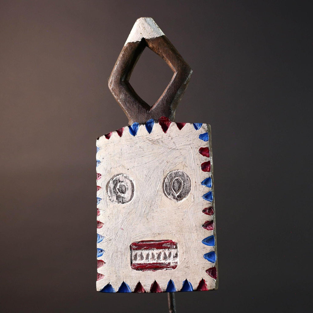 African wall mask Bwa tribal art wood face sculpture from Burkina Faso painted red blue white plank spirit mask with geometric crest G5468