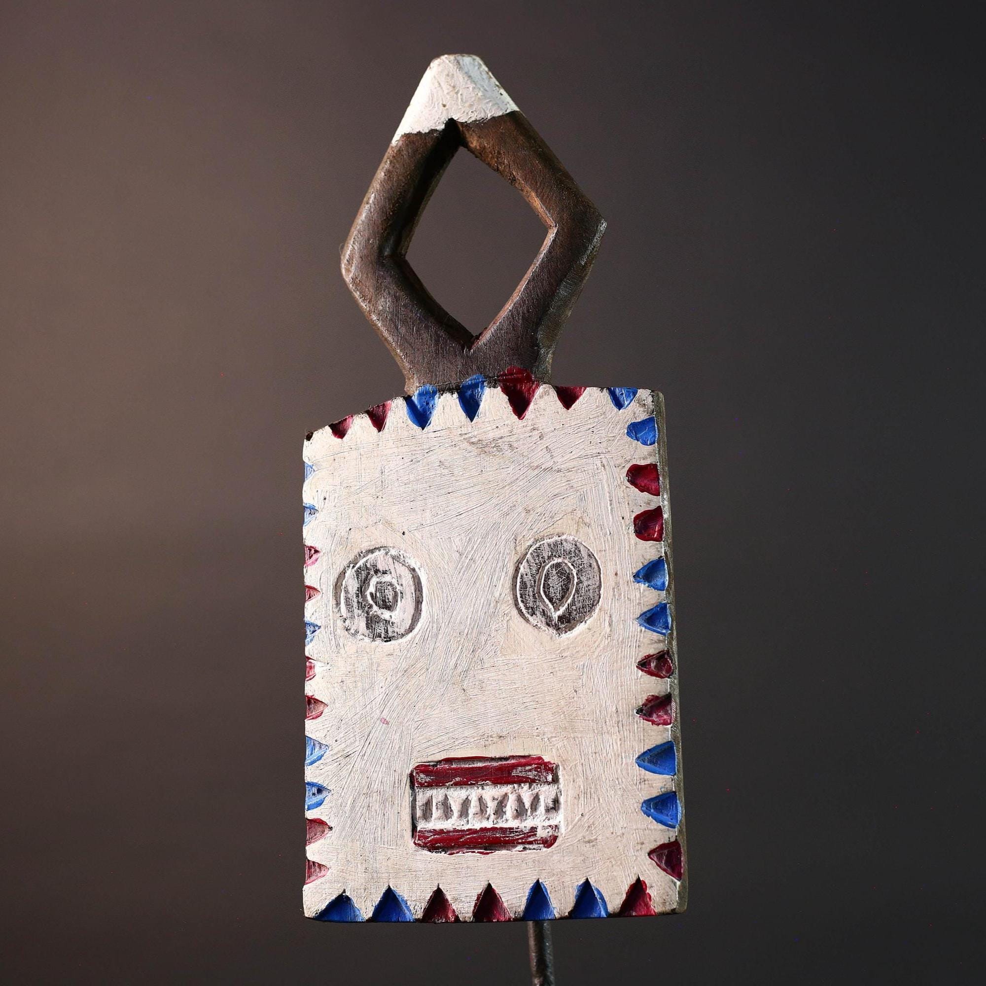 African wall mask Bwa tribal art wood face sculpture from Burkina Faso painted red blue white plank spirit mask with geometric crest G5468