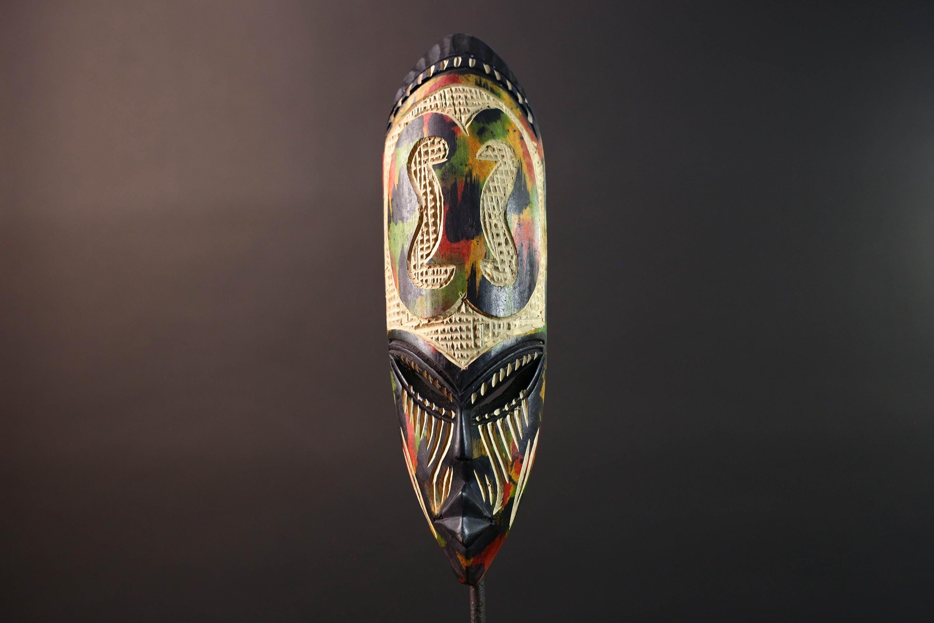 african cobra mask wall art hand carved wood tribal decor baule style snake sculpture multicolor geometric spiritual G5479