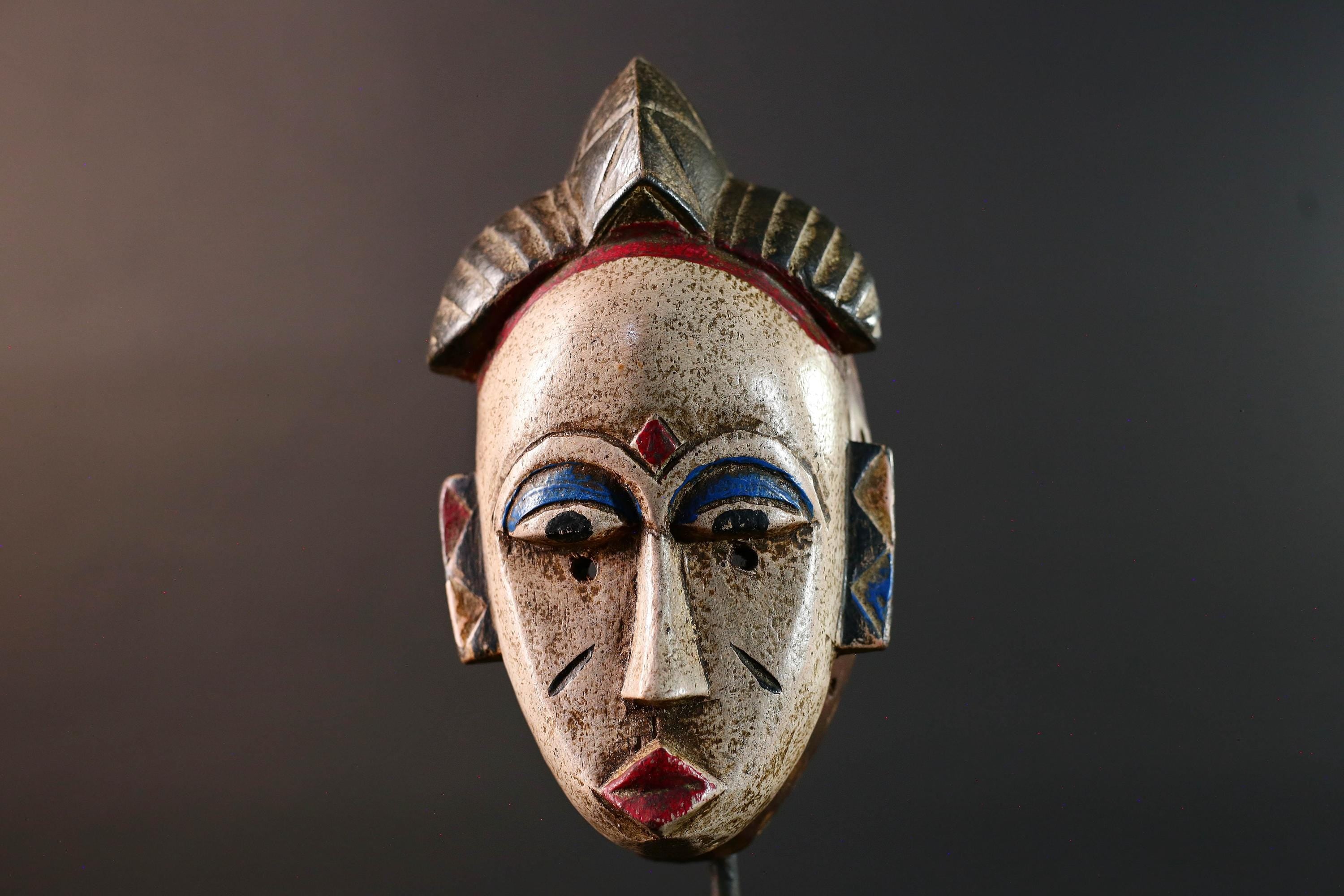 African tribal mask Baule carved wood wall decor with scarification red lips blue brows ivory tone artisan spiritual face sculpture-G5520