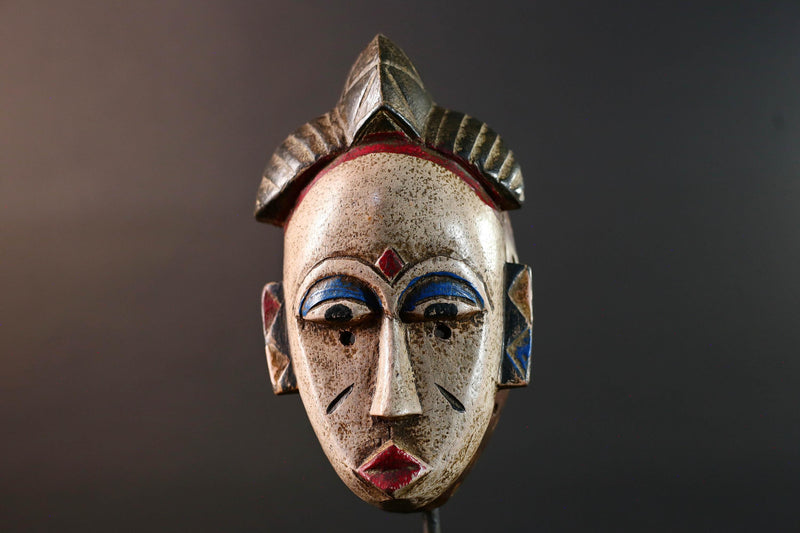 African tribal mask Baule carved wood wall decor with scarification red lips blue brows ivory tone artisan spiritual face sculpture-G5520