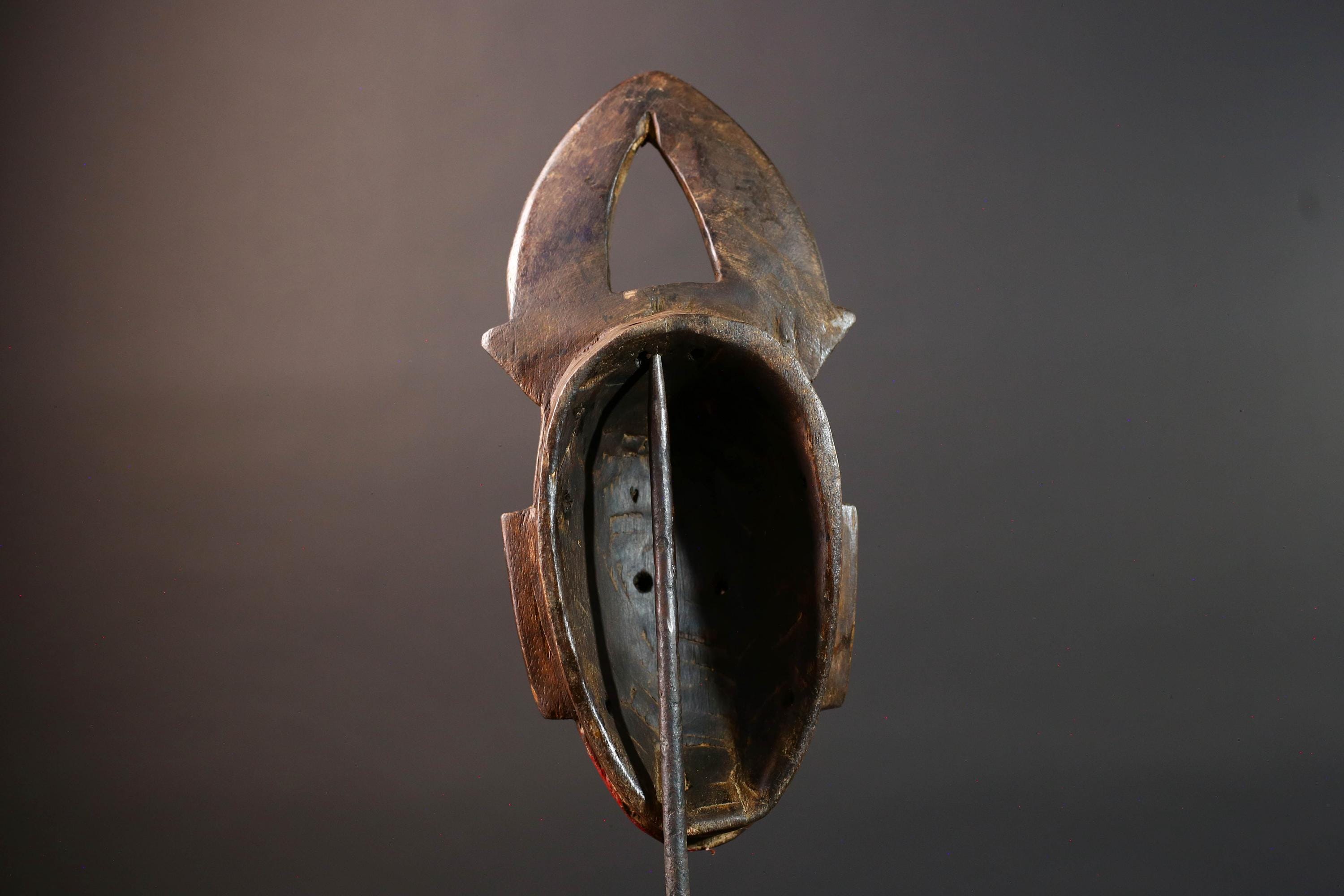 African tribal mask Guro carved wood wall decor with red face double horn crest stylized eyes artisan figure symbolic ethnic art-G5518