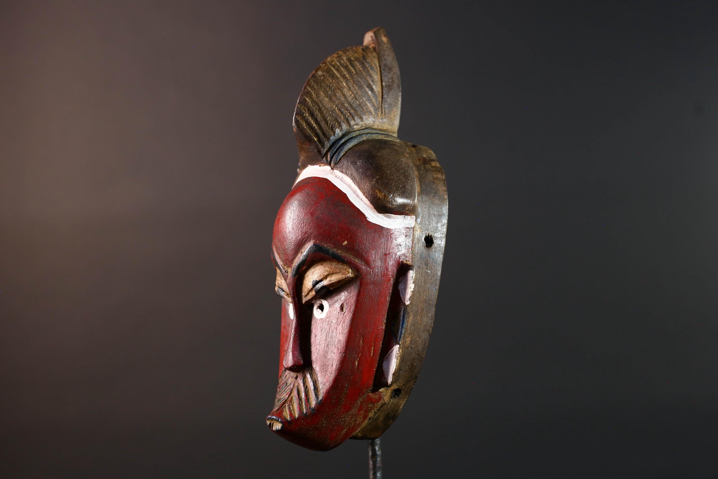 African mask Guro tribe wall art with red face carved crest and geometric cheek design tribal wood mask ethnic home decor-G5546