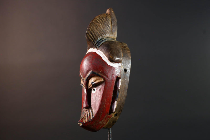 African mask Guro tribe wall art with red face carved crest and geometric cheek design tribal wood mask ethnic home decor-G5546