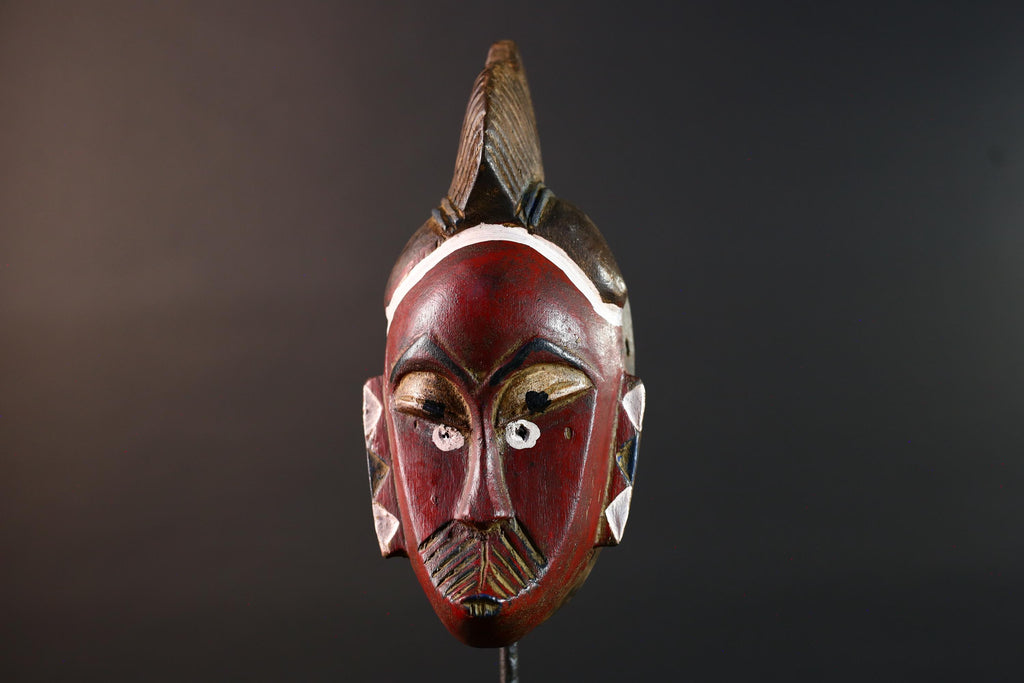 African mask Guro tribe wall art with red face carved crest and geometric cheek design tribal wood mask ethnic home decor-G5546