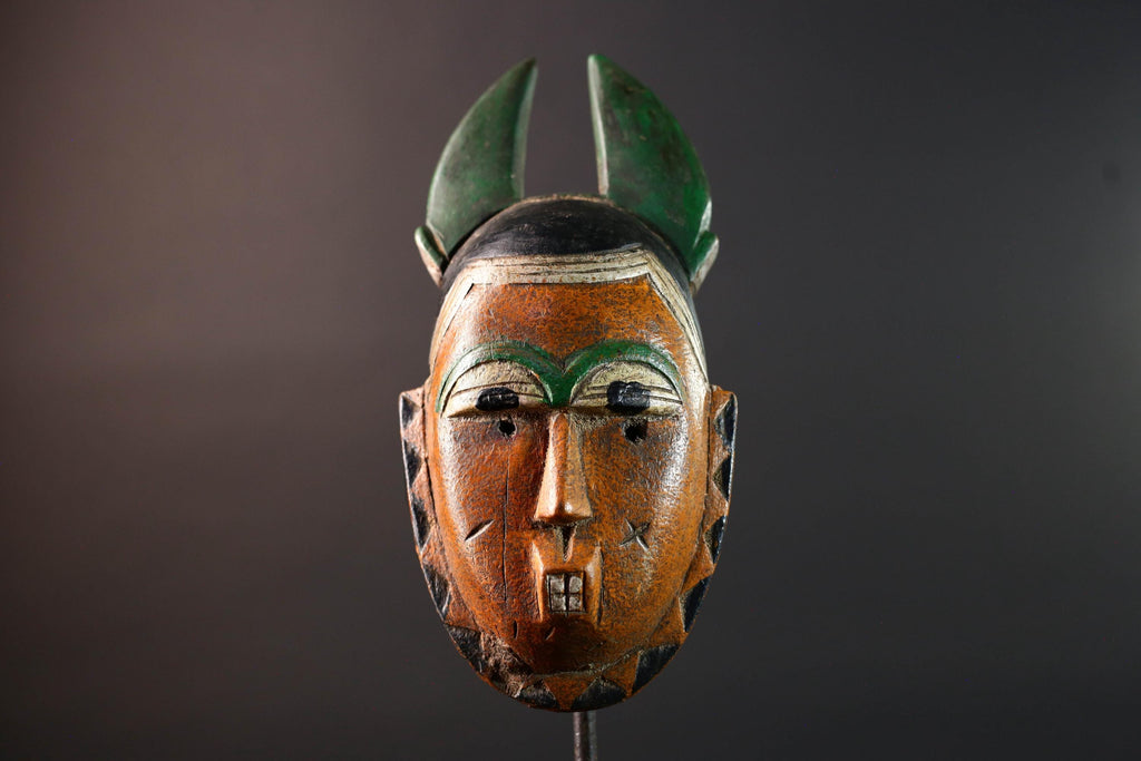 African mask Guro tribe orange face wall sculpture with green horn crest carved tribal cheek marks ethnic wood home art decor-G5542
