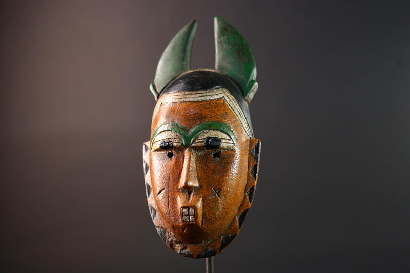 African mask Guro tribe orange face wall sculpture with green horn crest carved tribal cheek marks ethnic wood home art decor-G5542