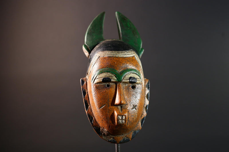 African mask Guro tribe orange face wall sculpture with green horn crest carved tribal cheek marks ethnic wood home art decor-G5542