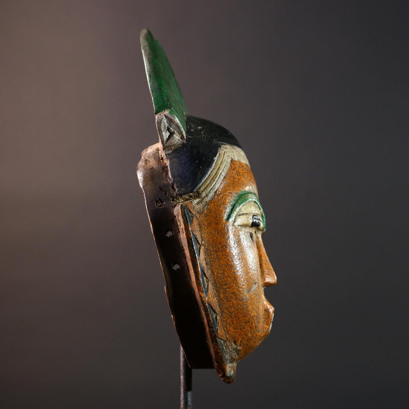 African mask Guro tribe orange face wall sculpture with green horn crest carved tribal cheek marks ethnic wood home art decor-G5542