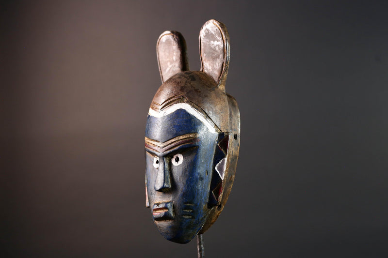 African mask Guro tribe blue face carved wood with white eyes animal crest and geometric ear panels tribal wall decor home art-G5541