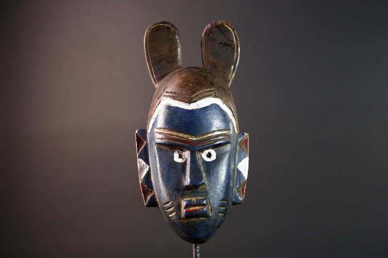 African mask Guro tribe blue face carved wood with white eyes animal crest and geometric ear panels tribal wall decor home art-G5541