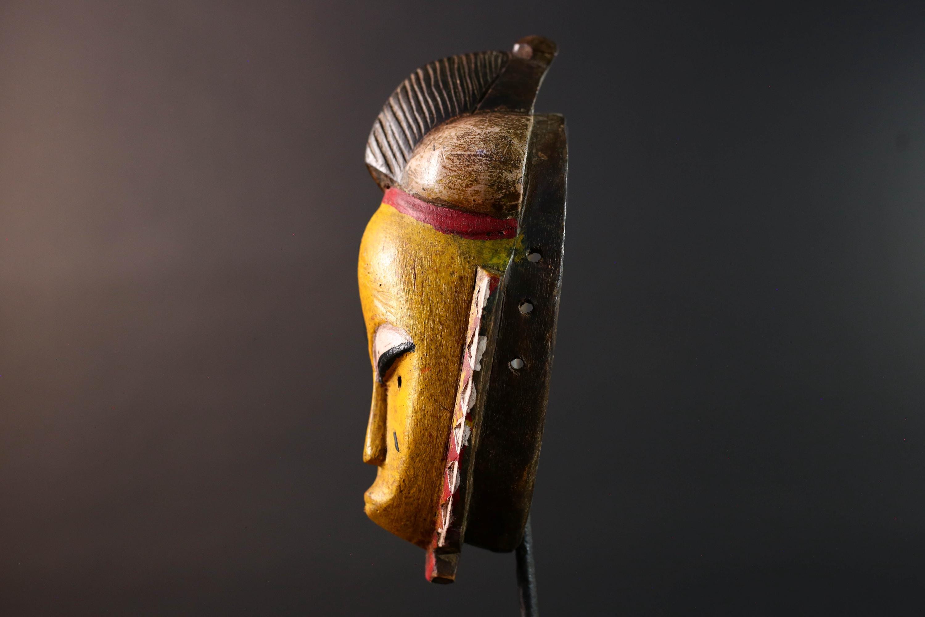 African mask Baule tribe yellow face carved wood with almond eyes rounded side buns geometric cheeks and central crest wall decor-G5539