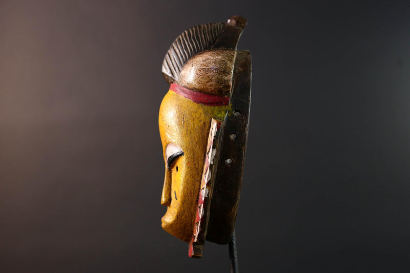 African mask Baule tribe yellow face carved wood with almond eyes rounded side buns geometric cheeks and central crest wall decor-G5539