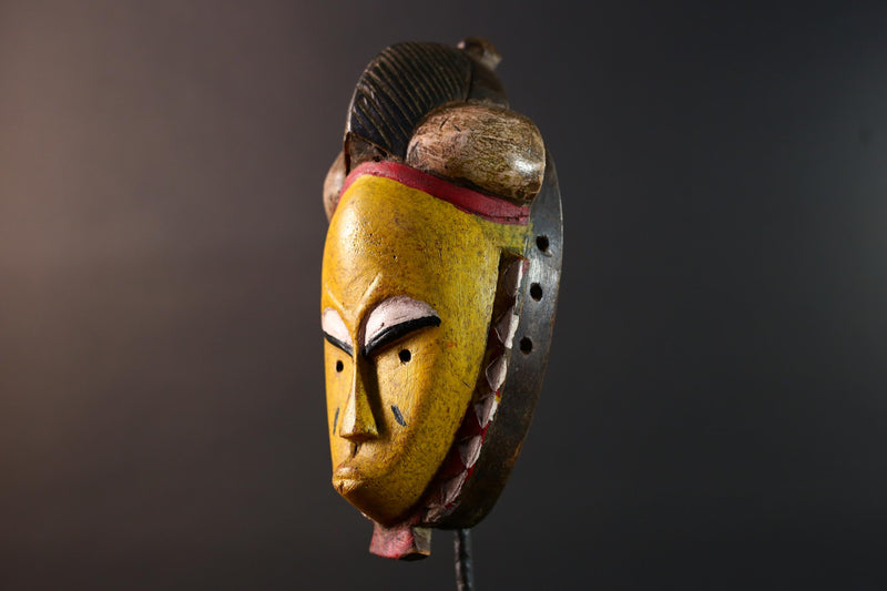 African mask Baule tribe yellow face carved wood with almond eyes rounded side buns geometric cheeks and central crest wall decor-G5539