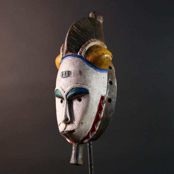 African mask Baule white face with horn crest red triangle trim green blue paint tribal wall decor spiritual carving wood sculpture-G5549