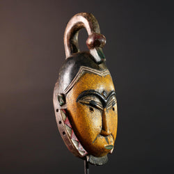 African mask Guro carving yellow face with animal crest red white triangle trim tribal wall decor wood sculpture spiritual art-G5548