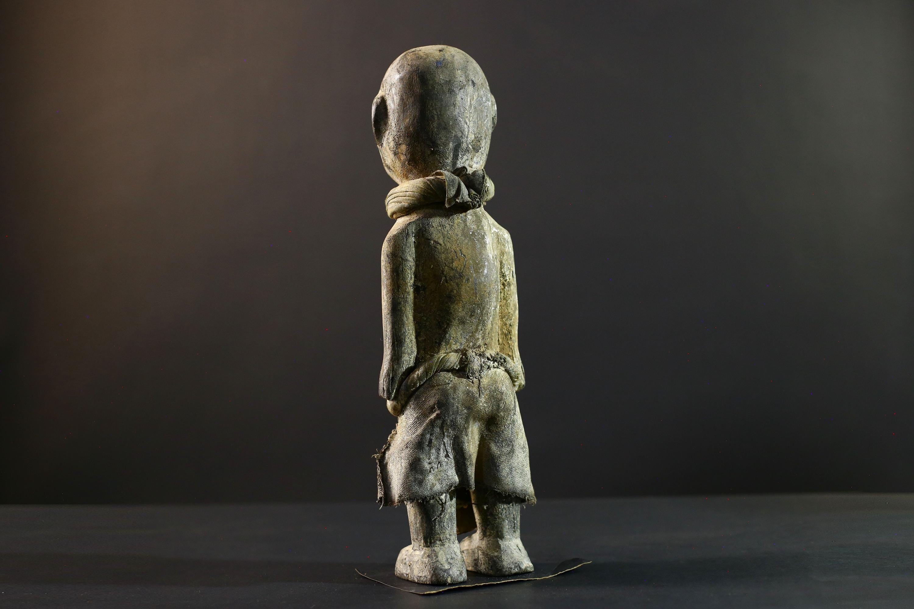 African Songye statue wood ancestor figure tribal spirit art Congo ritual carving handmade sculpture hollow eyes symbolic charm decor-G5373