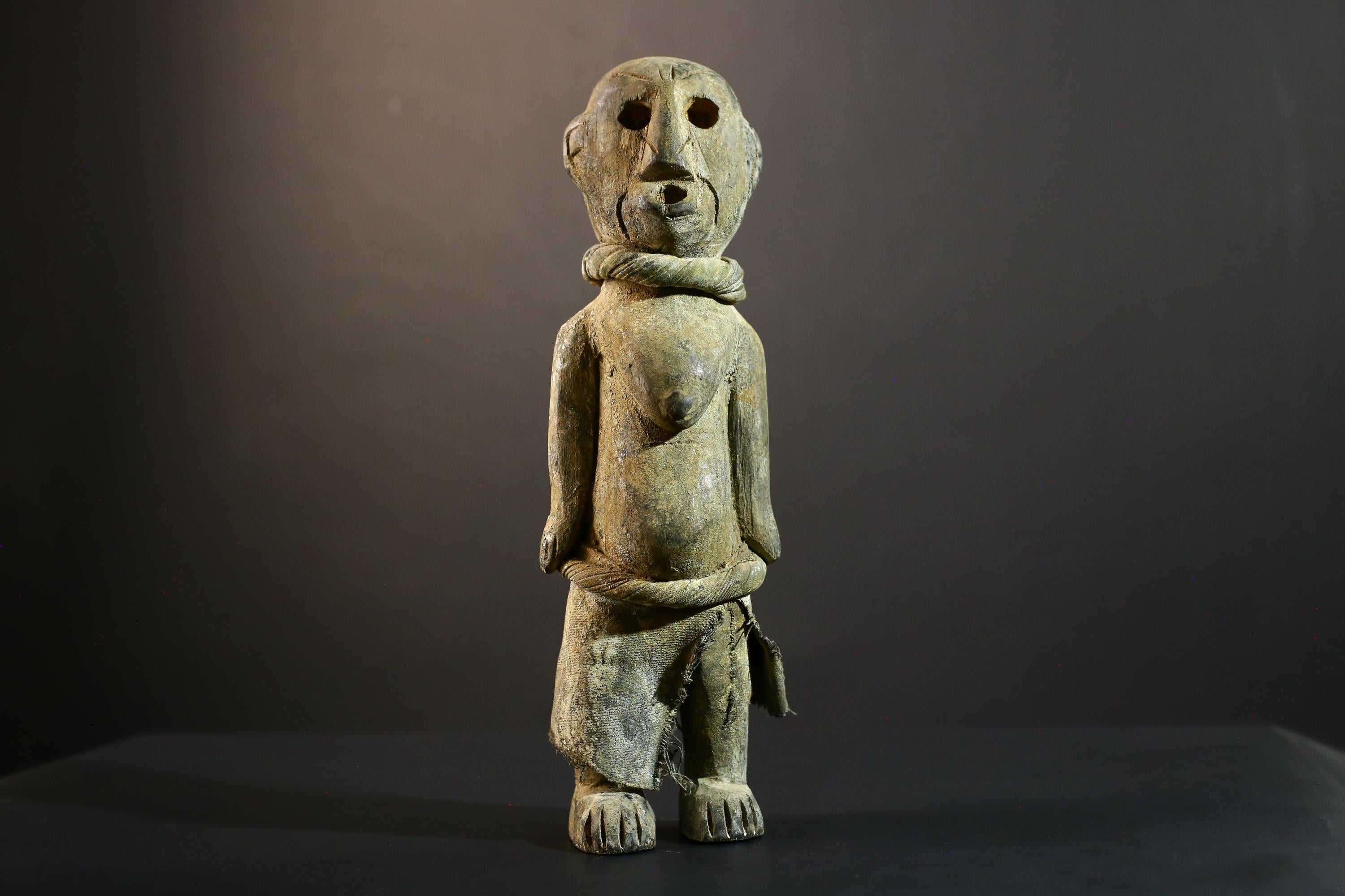 African Songye statue wood ancestor figure tribal spirit art Congo ritual carving handmade sculpture hollow eyes symbolic charm decor-G5373