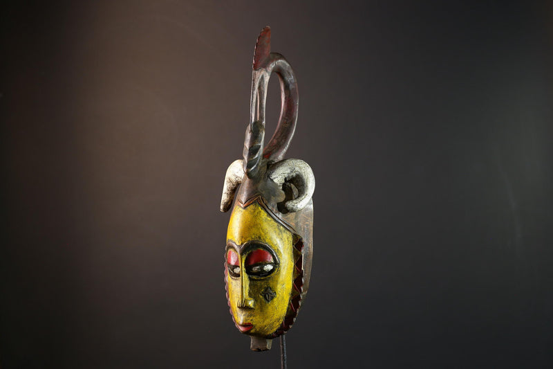 Tribal wall mask, yellow face carving, Yaure African art, funeral spirit decor, hand carved wall piece, cultural face sculpture-G5381