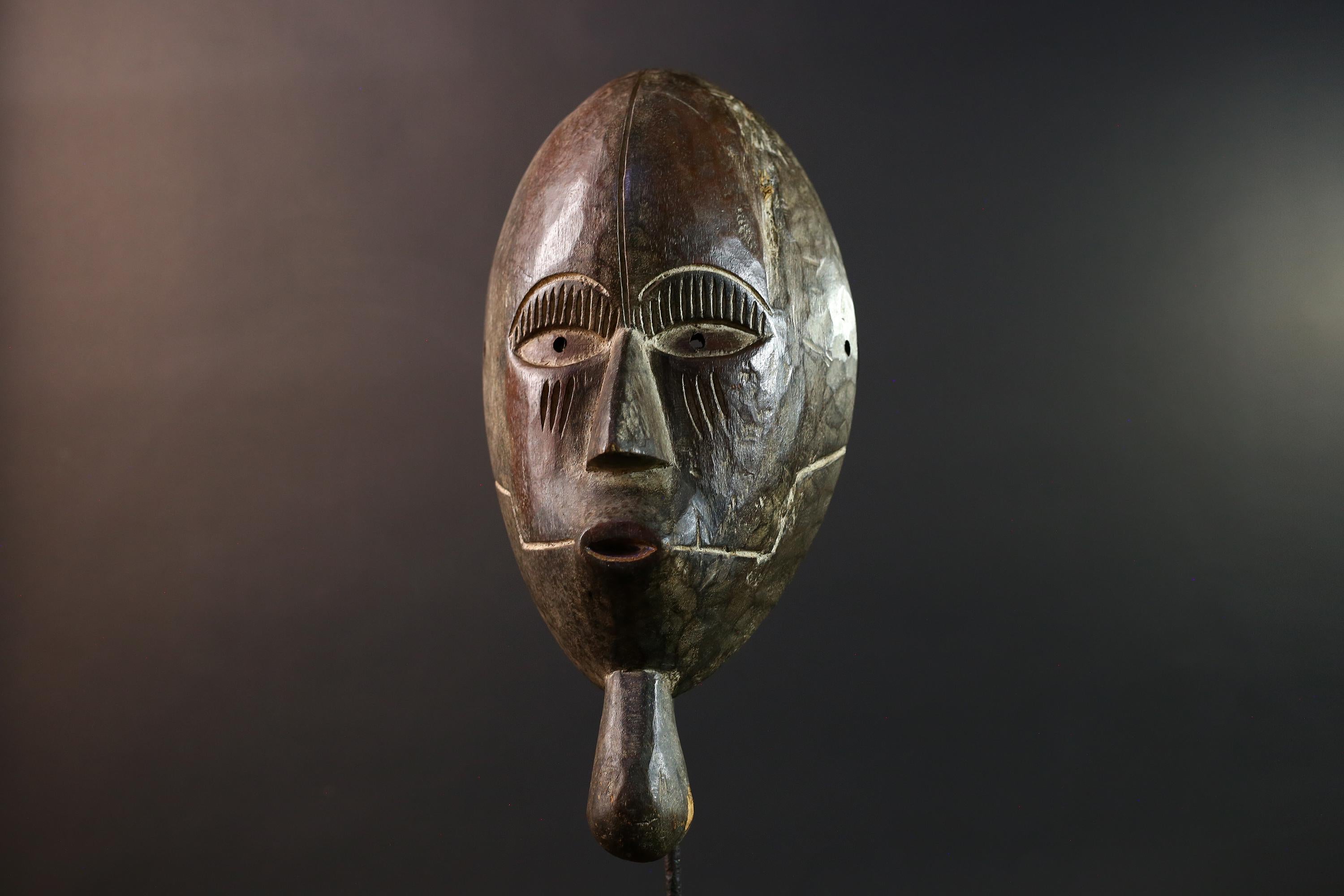 Dan tribal mask African carved wood wall decor with chin extension from Côte d’Ivoire Liberia ceremonial rustic art face carving-G5436