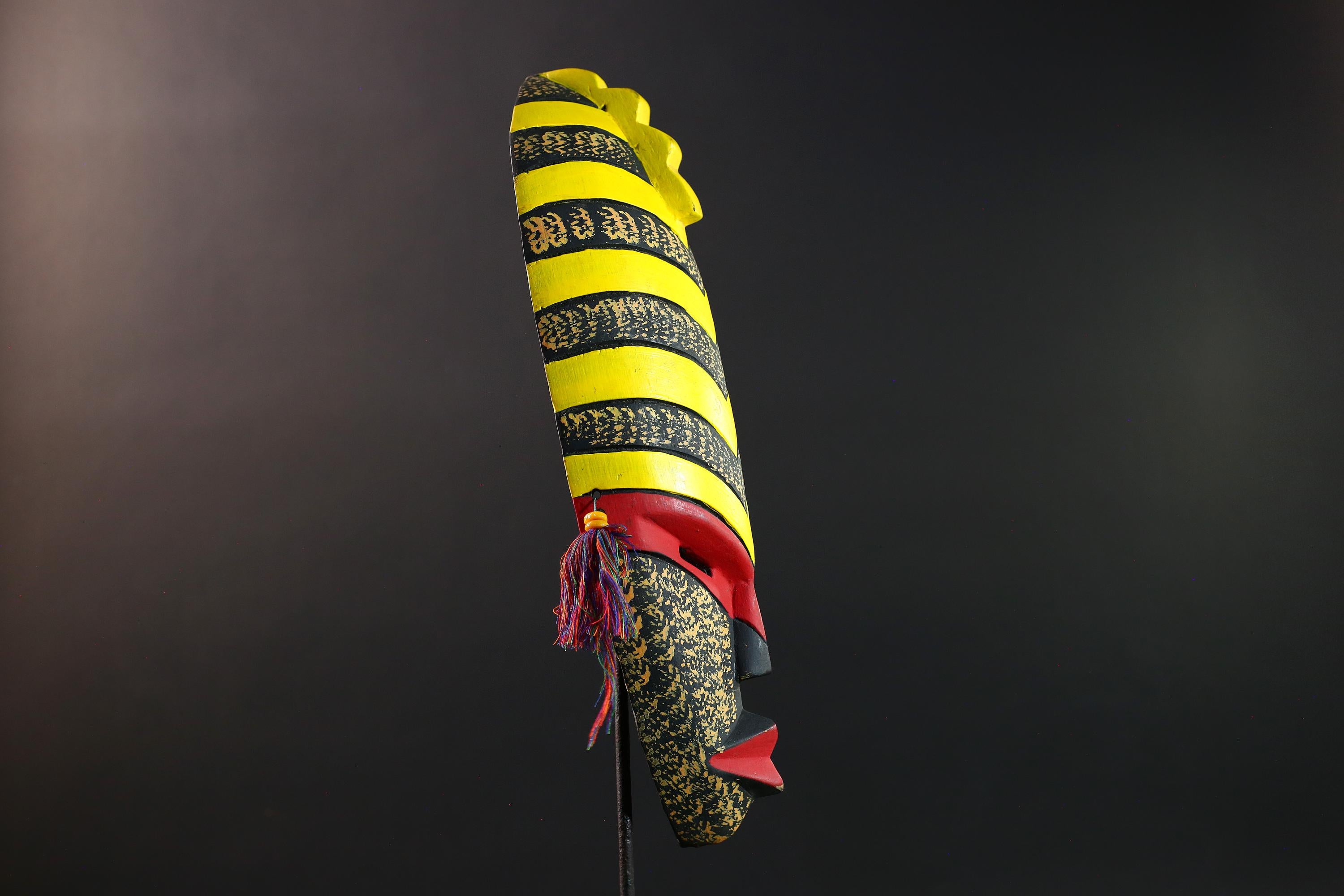 African tribal mask yellow black chevron face carving with red eyes and side tassels from Gabon or Congo handmade wall decor art- G5441
