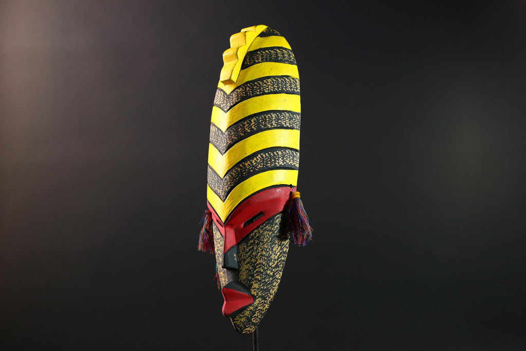 African tribal mask yellow black chevron face carving with red eyes and side tassels from Gabon or Congo handmade wall decor art- G5441