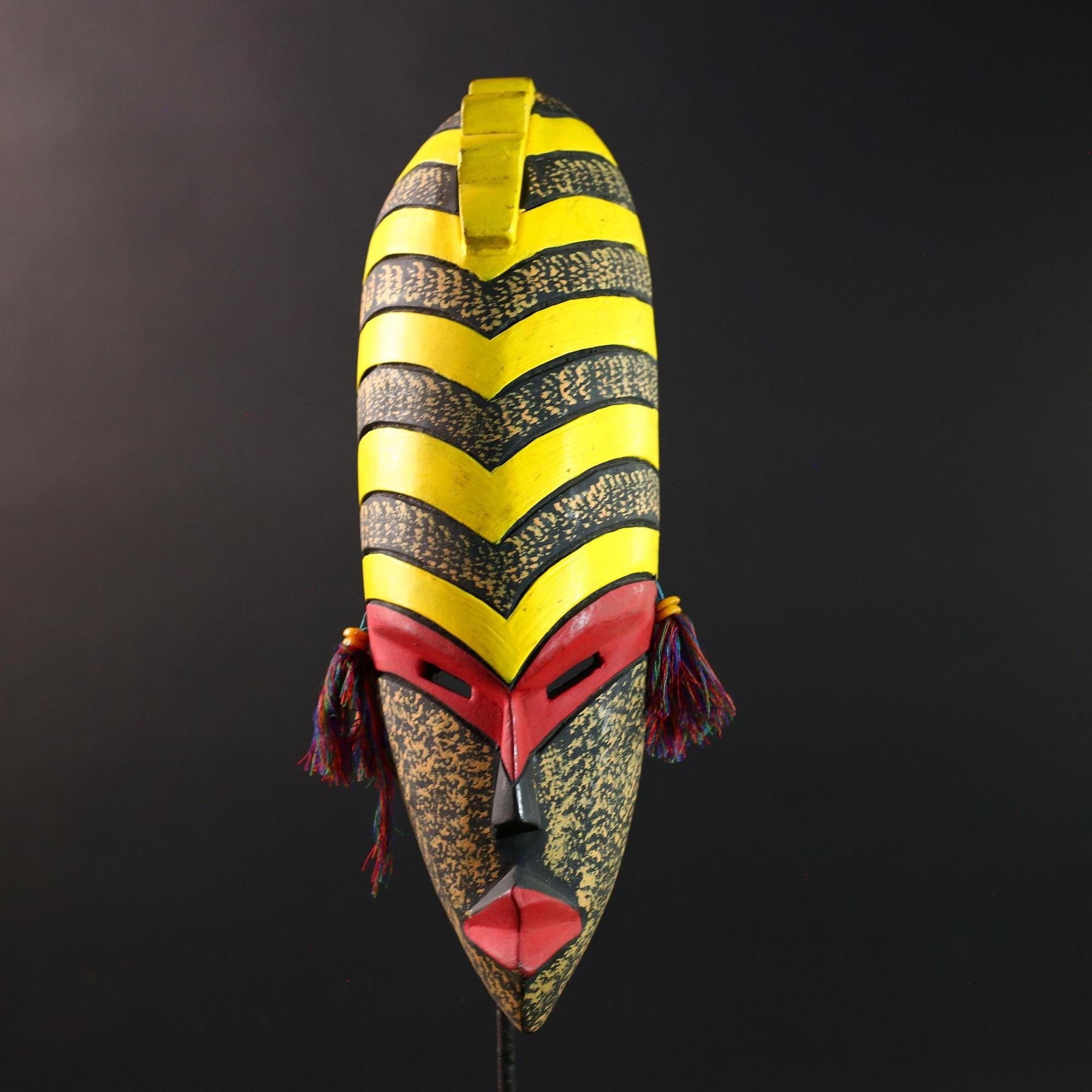 African tribal mask yellow black chevron face carving with red eyes and side tassels from Gabon or Congo handmade wall decor art- G5441