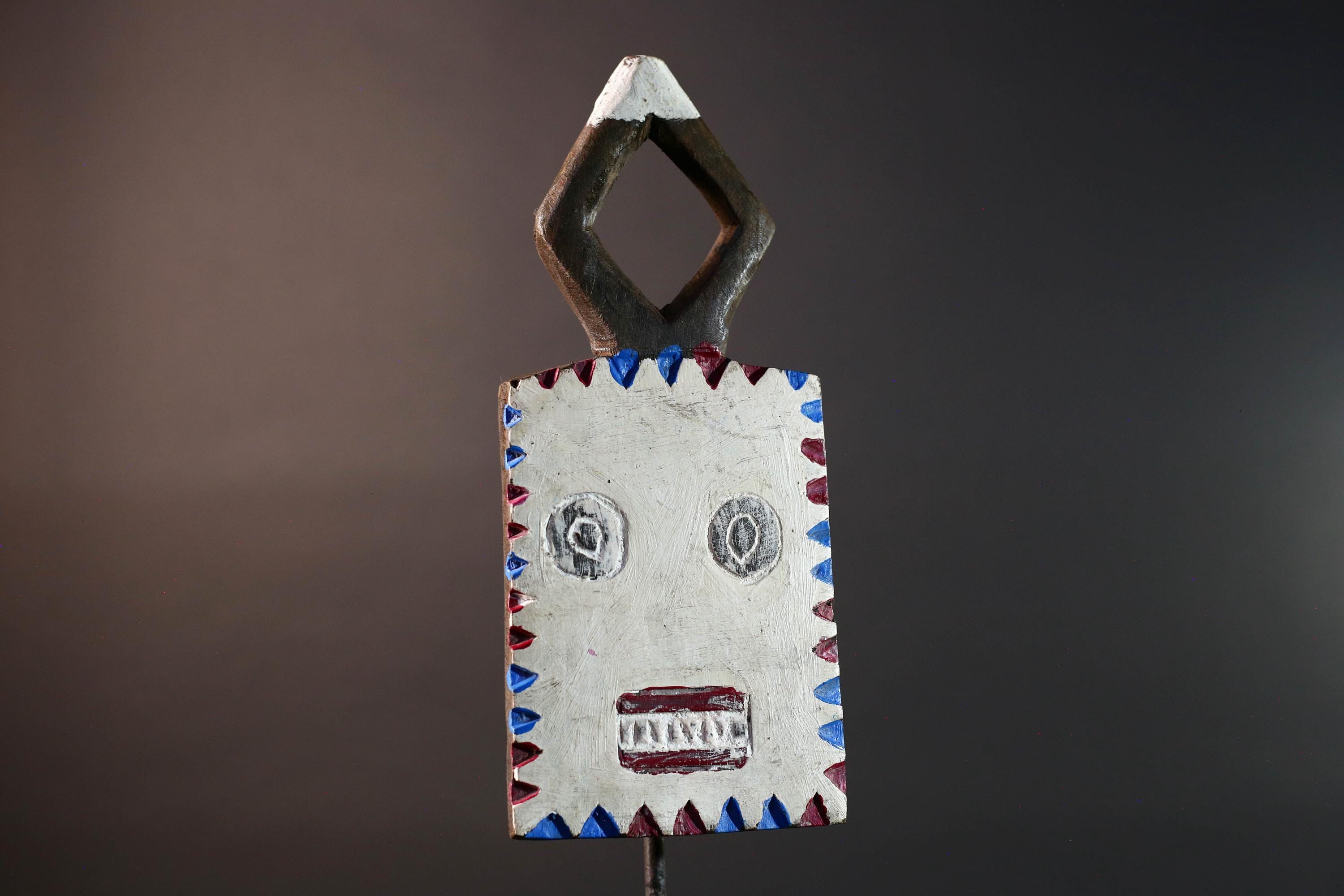 African wall mask Bwa tribal art wood face sculpture from Burkina Faso painted red blue white plank spirit mask with geometric crest G5468