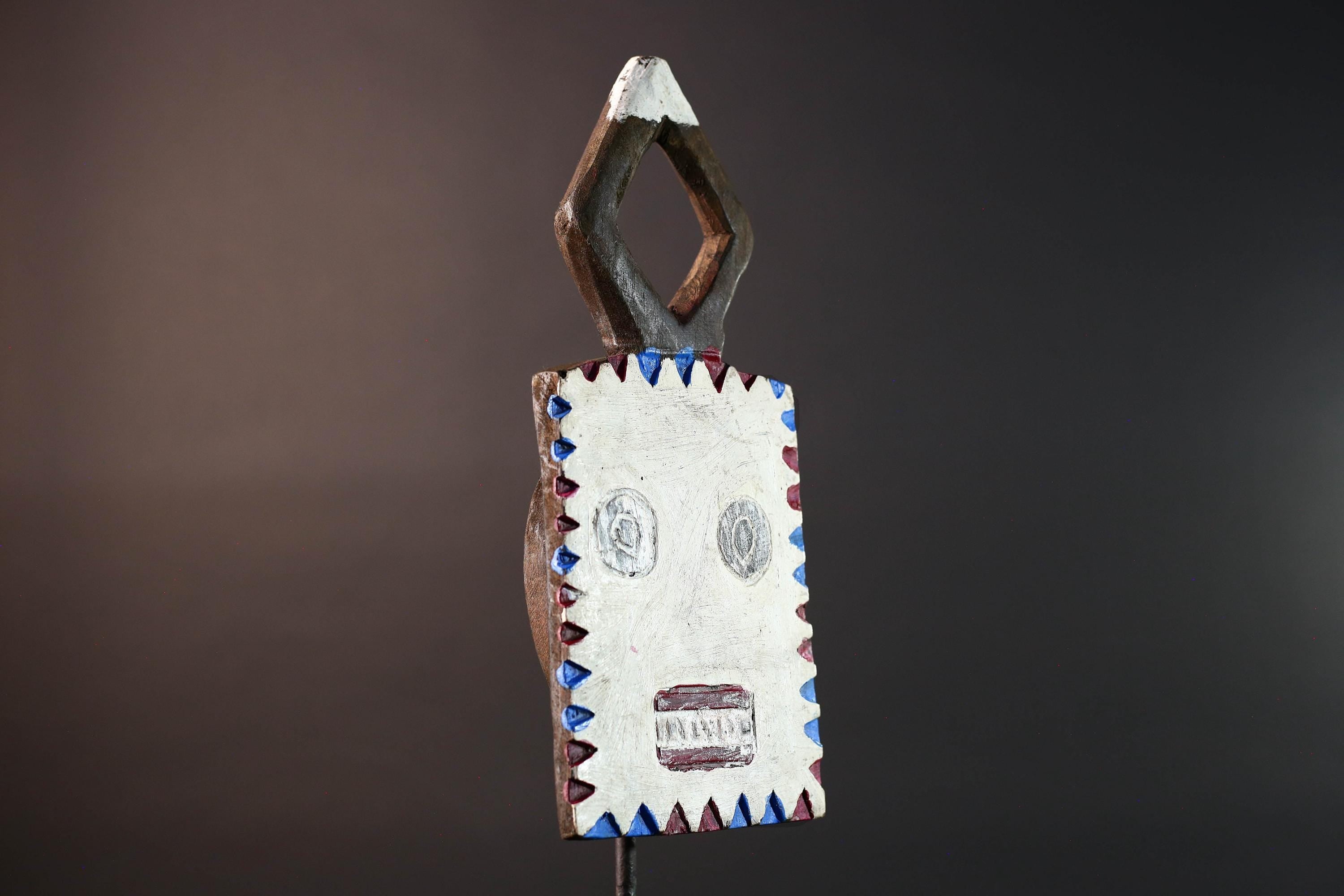 African wall mask Bwa tribal art wood face sculpture from Burkina Faso painted red blue white plank spirit mask with geometric crest G5468